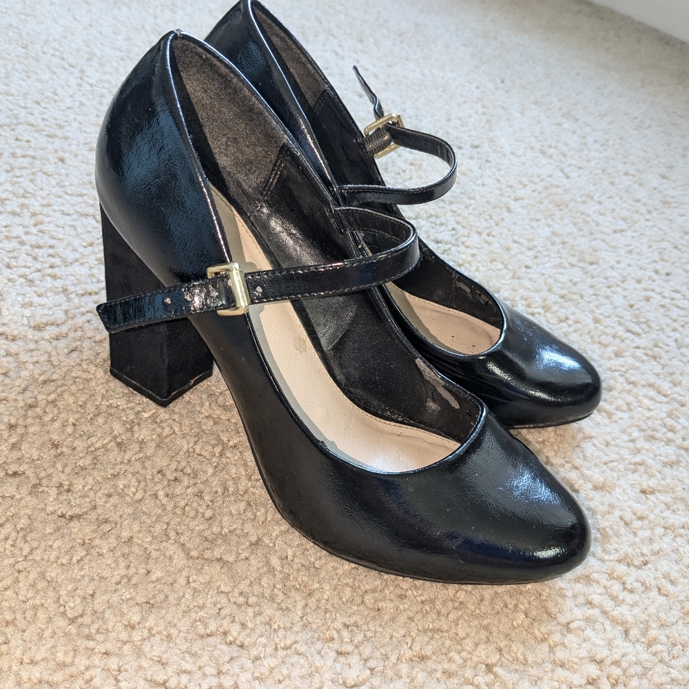 Women's Black Cato T-strap Pumps.